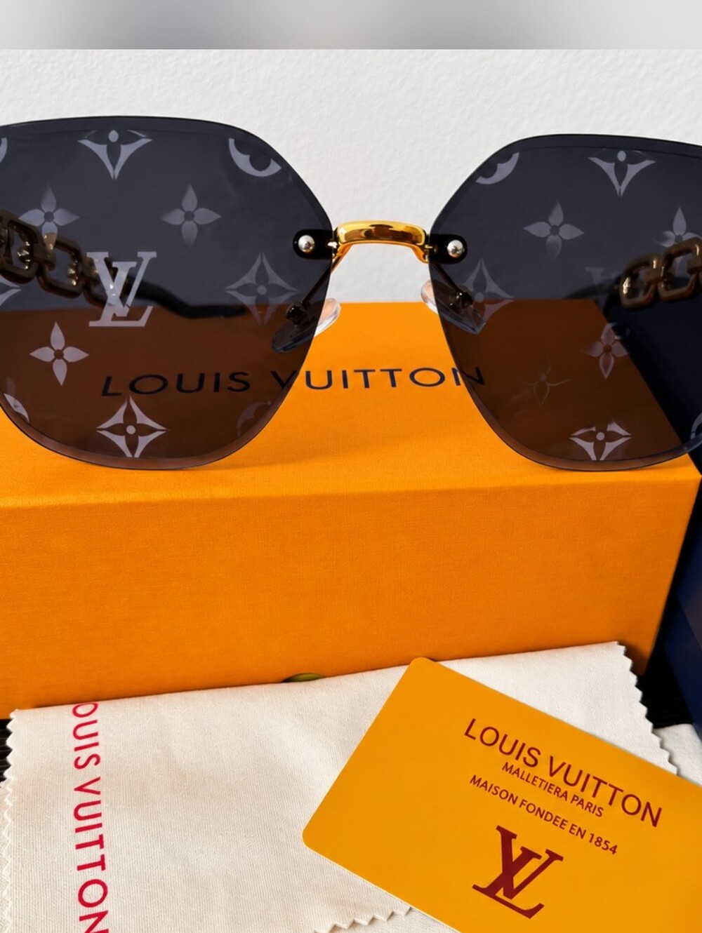Women’s Black Sunglasses with Gold Chain-Style Frame